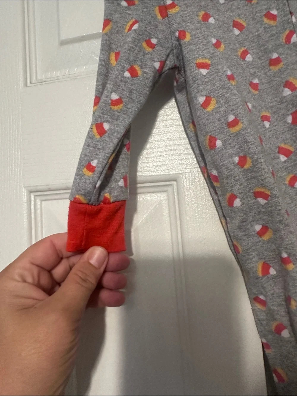 Baby Candy Corn Print Footed One-Piece Pajamas - Gray and Orange